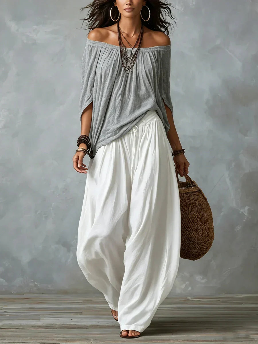 Completo Aurora con pantaloni palazzo in grigio