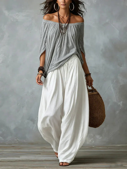 Completo Aurora con pantaloni palazzo in grigio